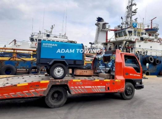 ADAM TOWING